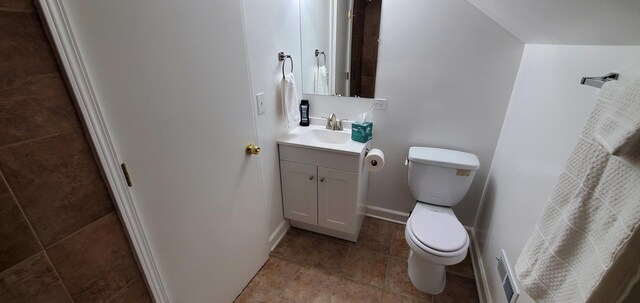 4627 W Schubert Ave, Chicago, IL 60639 - bathroom with toilet, vanity, tile patterned floors, and baseboards
