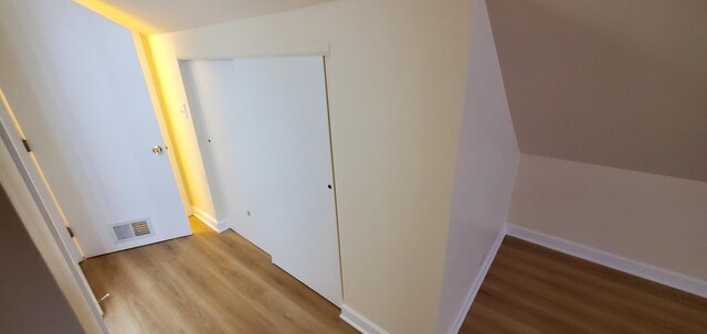 4627 W Schubert Ave, Chicago, IL 60639 - hall featuring visible vents, baseboards, and wood finished floors