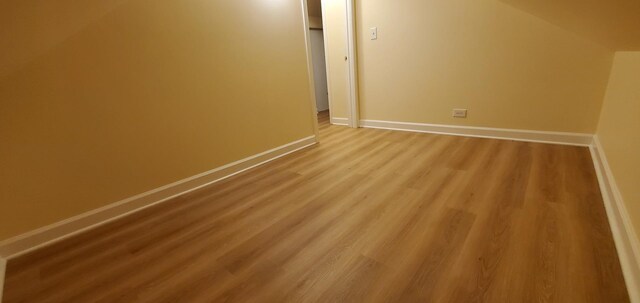 4627 W Schubert Ave, Chicago, IL 60639 - additional living space featuring baseboards and light wood finished floors