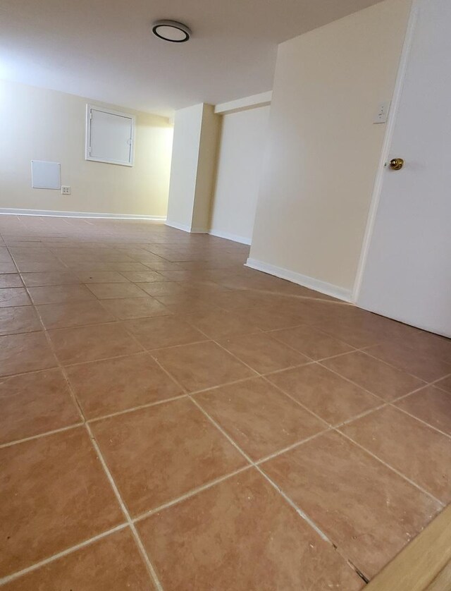 4627 W Schubert Ave, Chicago, IL 60639 - unfurnished room featuring tile patterned flooring and baseboards