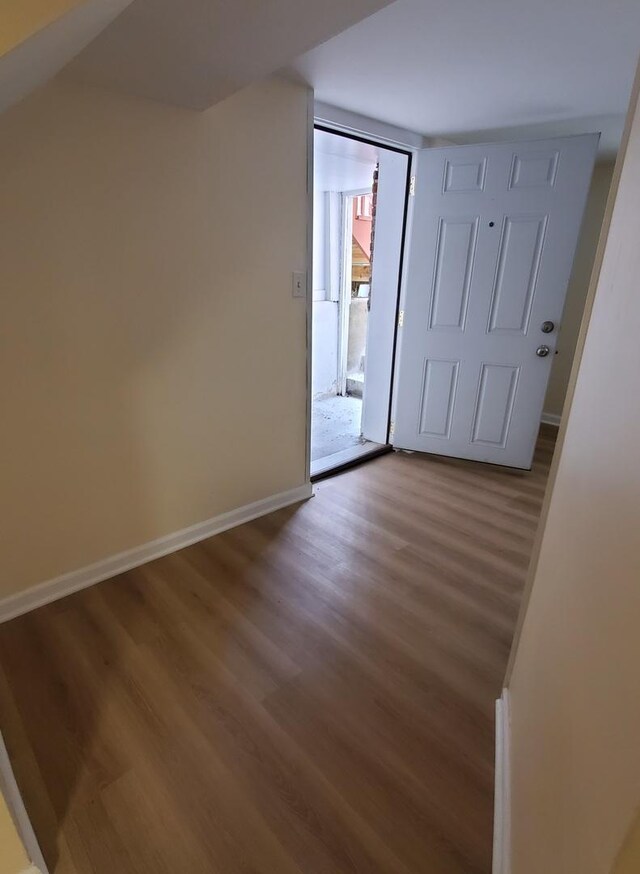 4627 W Schubert Ave, Chicago, IL 60639 - entrance foyer featuring baseboards and wood finished floors