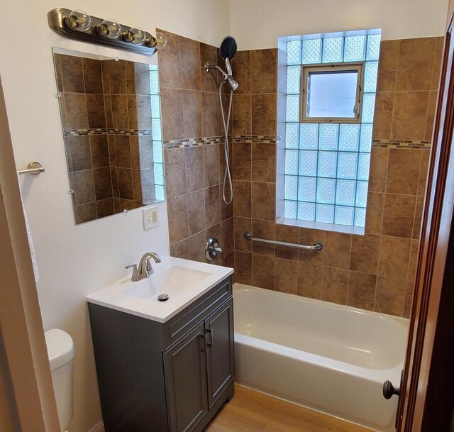 4627 W Schubert Ave, Chicago, IL 60639 - full bathroom featuring toilet, vanity, and bathing tub / shower combination