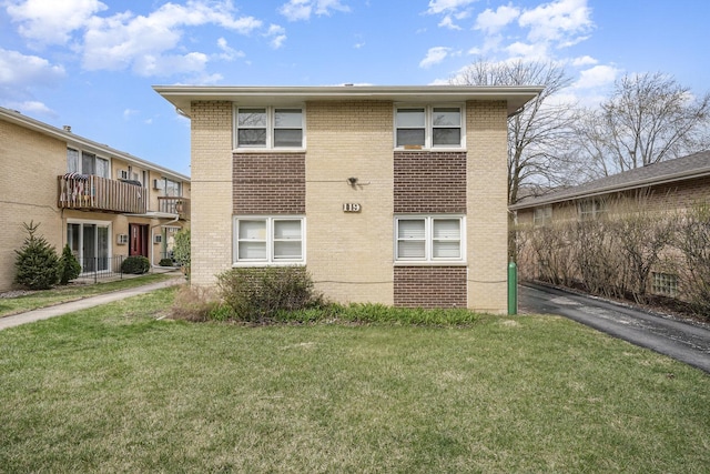 119 N Cliff St, Willow Springs, IL 60480 - view of home's exterior featuring brick siding and a lawn