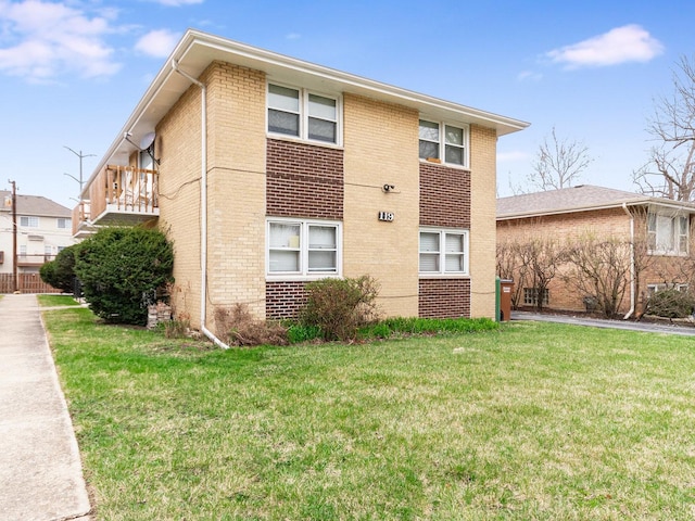 119 N Cliff St, Willow Springs, IL 60480 - view of side of home featuring brick siding and a lawn