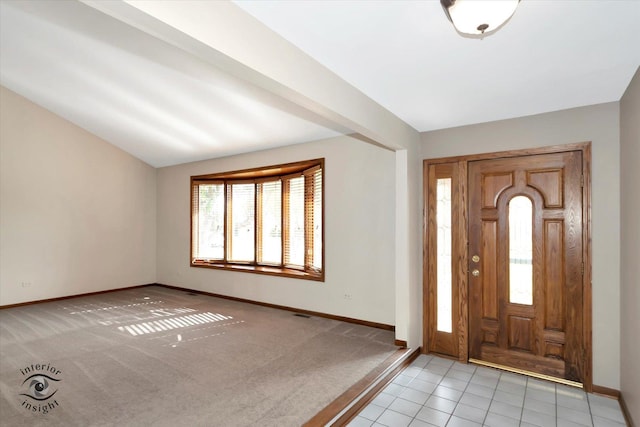 entrance foyer with light carpet and baseboards