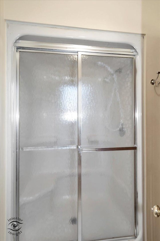 bathroom with a stall shower