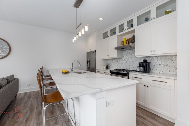 43 Windward Way, Ottawa, IL 61350 - kitchen with a sink, appliances with stainless steel finishes, white cabinets, and backsplash