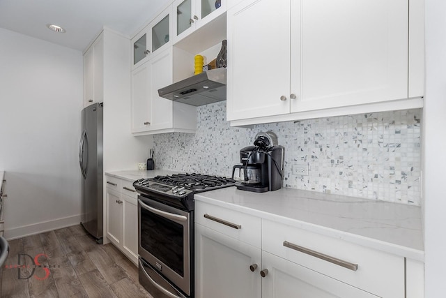 43 Windward Way, Ottawa, IL 61350 - kitchen with exhaust hood, appliances with stainless steel finishes, wood finished floors, glass insert cabinets, and white cabinetry