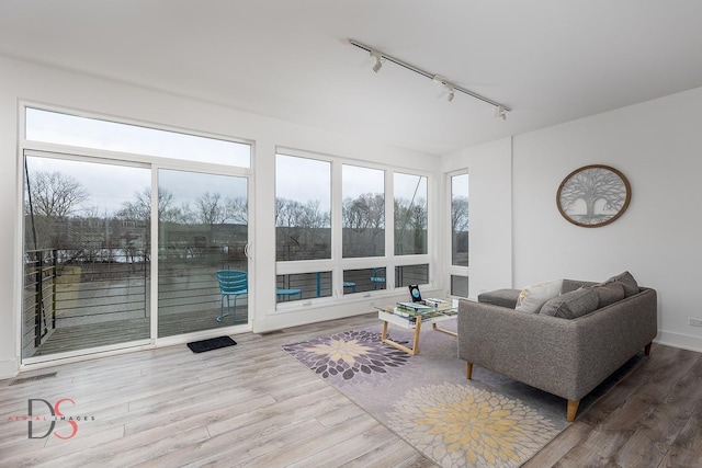 43 Windward Way, Ottawa, IL 61350 - living room featuring visible vents, track lighting, and wood finished floors