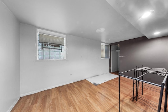 playroom featuring wood finished floors and baseboards