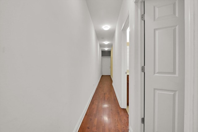 6510 S Woodlawn Ave Unit 1, Chicago, IL 60637 - hall with dark wood-style floors and baseboards