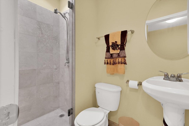 6510 S Woodlawn Ave Unit 1, Chicago, IL 60637 - bathroom featuring toilet, a sink, and a stall shower