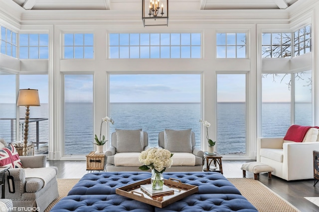 sunroom with a water view