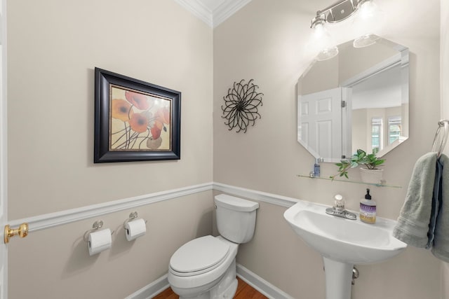 1574 Farmside Ln, Bolingbrook, IL 60490 - half bathroom with toilet, a sink, ornamental molding, and baseboards