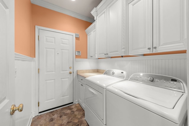 1574 Farmside Ln, Bolingbrook, IL 60490 - laundry room with crown molding, stone finish floor, a wainscoted wall, washer and dryer, and cabinet space