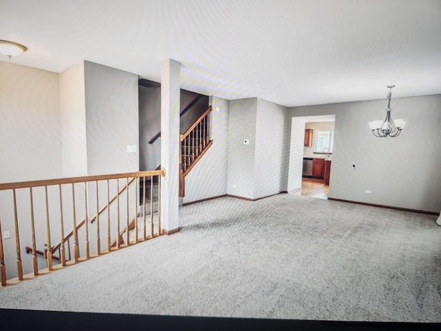 1208 Fox Hill Ln, North Aurora, IL 60542 - empty room with a chandelier, stairway, baseboards, and carpet floors