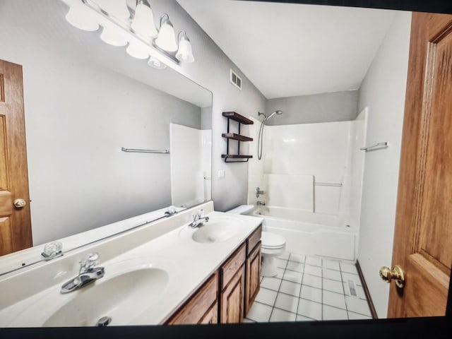 1208 Fox Hill Ln, North Aurora, IL 60542 - bathroom with bathing tub / shower combination, visible vents, a sink, and toilet