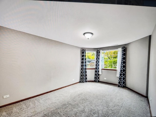 1208 Fox Hill Ln, North Aurora, IL 60542 - carpeted spare room featuring baseboards