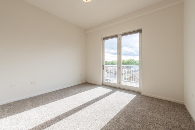 3630 N Harlem Ave Unit 410, Chicago, IL 60634 - empty room featuring light carpet and baseboards