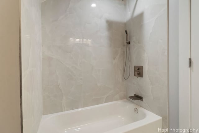 bathroom featuring tub / shower combination