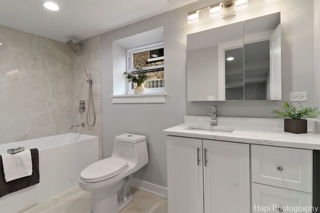full bathroom with toilet, vanity, a shower, and baseboards