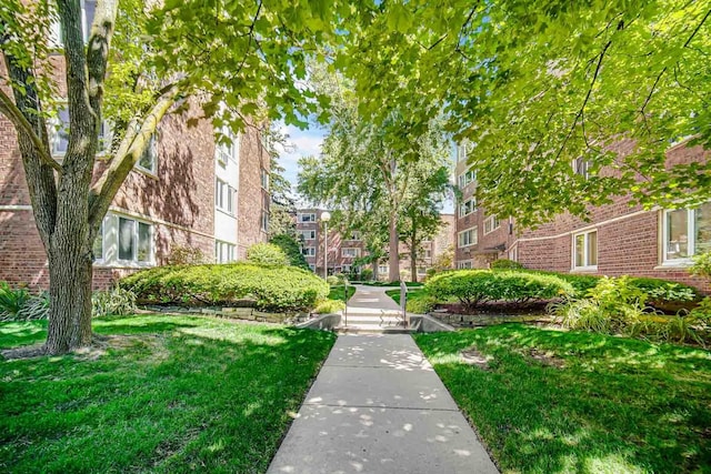 surrounding community featuring a lawn