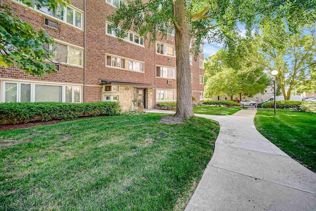 surrounding community with a yard