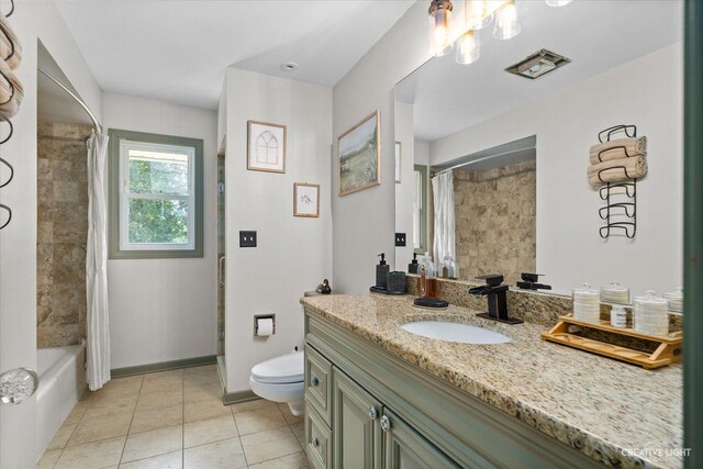 12N988 Engel Rd, Sycamore, IL 60178 - full bathroom with tile patterned flooring, vanity, toilet, shower / bathtub combination with curtain, and baseboards