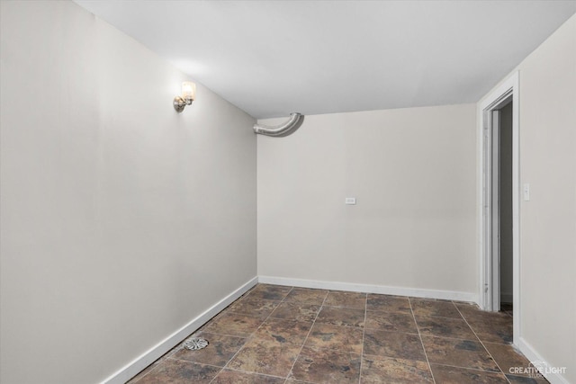12N988 Engel Rd, Sycamore, IL 60178 - below grade area with baseboards and stone finish floor