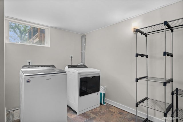12N988 Engel Rd, Sycamore, IL 60178 - laundry area with laundry area, baseboards, washing machine and dryer, and stone finish floor
