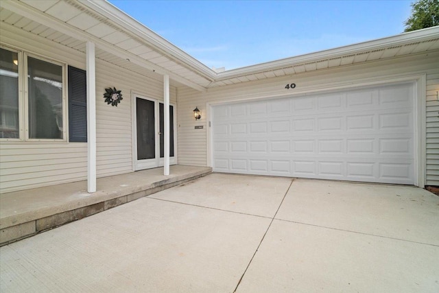 garage with driveway