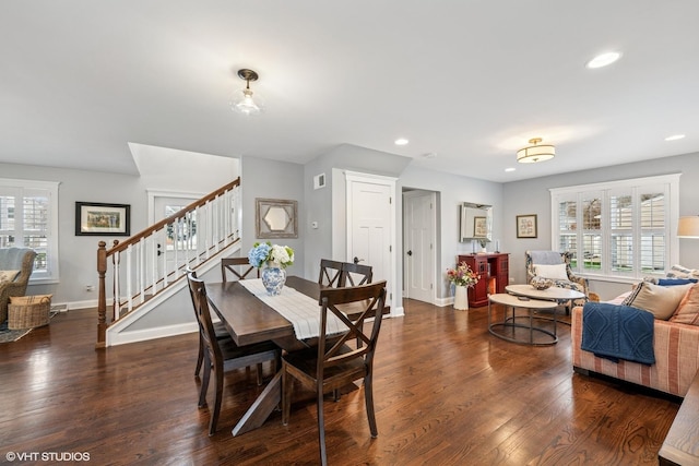 dining space featuring baseboards, recessed lighting, stairs, visible vents, and wood finished floors