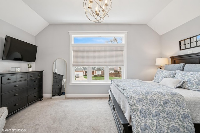 bedroom with a chandelier, multiple windows, light colored carpet, and lofted ceiling