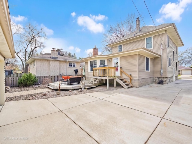431 N Brainard Ave, La Grange Park, IL 60526 - rear view of house with outdoor lounge area, a chimney, a wooden deck, and fence
