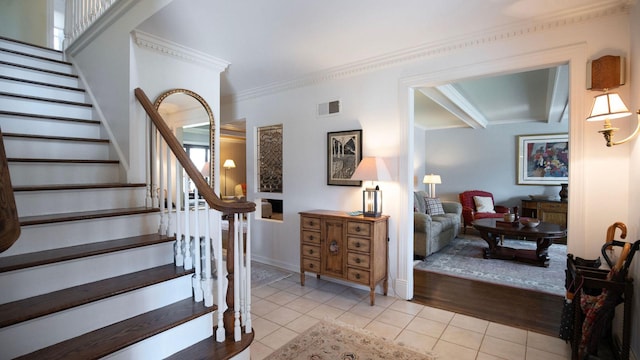 1336 Christina Ln, Northbrook, IL 60062 - staircase with crown molding, visible vents, tile patterned floors, and baseboards