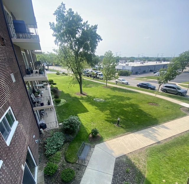 5300 Walnut Ave Unit 7C, Downers Grove, IL 60515 - surrounding community with a lawn