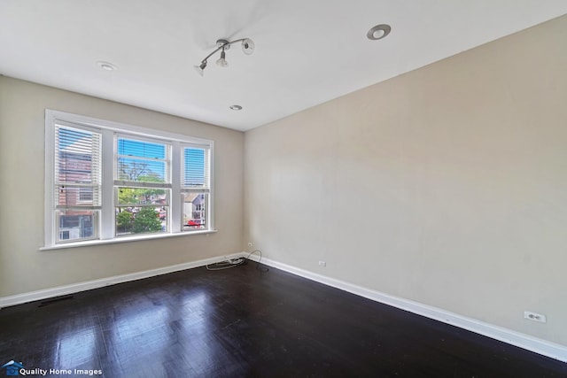 2701 W 24th Pl, Chicago, IL 60608 - unfurnished room with recessed lighting, dark wood-type flooring, visible vents, and baseboards