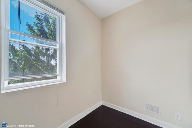 2701 W 24th Pl, Chicago, IL 60608 - unfurnished room featuring baseboards, visible vents, and a wealth of natural light