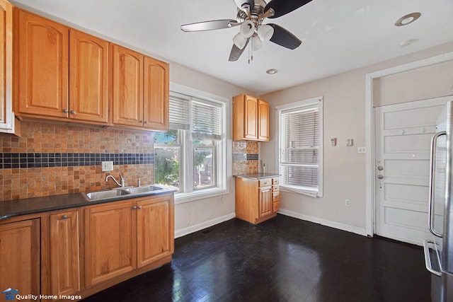 2701 W 24th Pl, Chicago, IL 60608 - kitchen featuring stainless steel refrigerator, a sink, a ceiling fan, and decorative backsplash