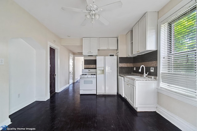 2701 W 24th Pl, Chicago, IL 60608 - kitchen with plenty of natural light, white appliances, and a sink