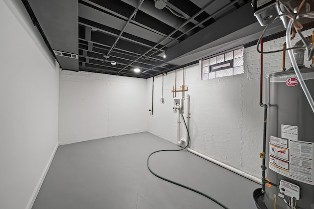 basement featuring water heater