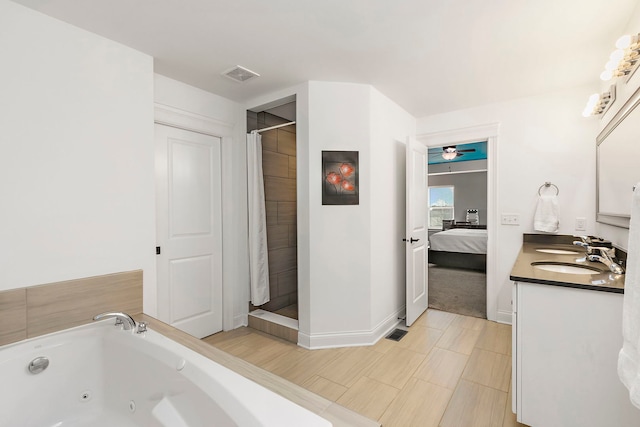 bathroom featuring ensuite bathroom, visible vents, a jetted tub, and a shower stall