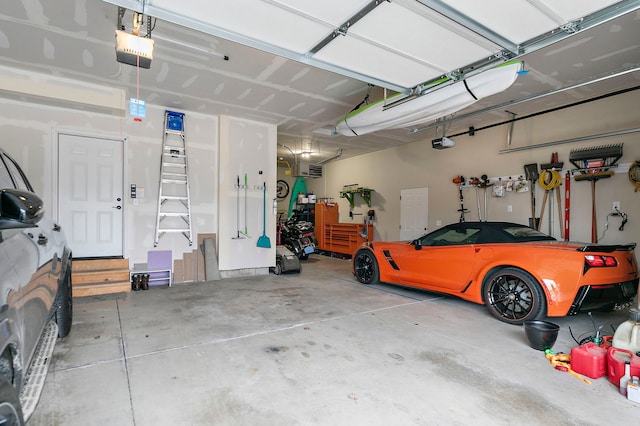 garage featuring a garage door opener