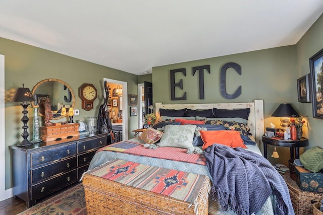 bedroom featuring wood finished floors