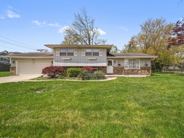 201 41st St, Downers Grove, IL 60515 - split level home with a garage, concrete driveway, board and batten siding, and brick siding