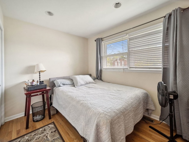 201 41st St, Downers Grove, IL 60515 - bedroom with wood finished floors and baseboards