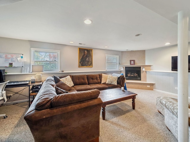 201 41st St, Downers Grove, IL 60515 - living area with carpet flooring, wainscoting, a fireplace with raised hearth, and recessed lighting