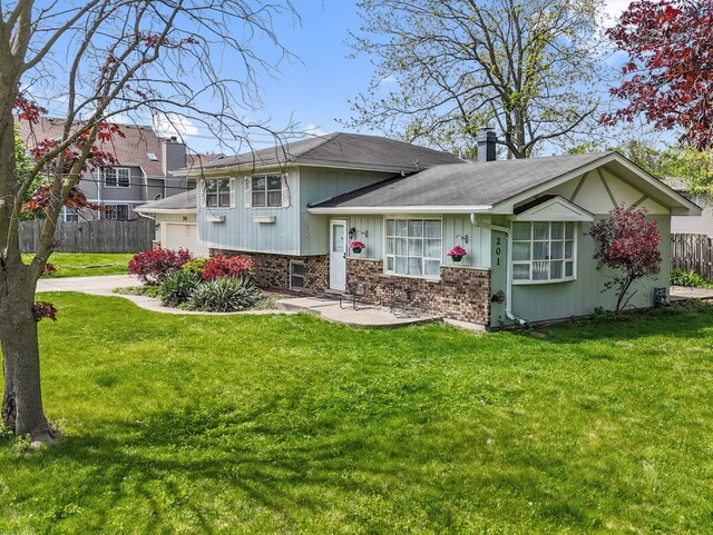 201 41st St, Downers Grove, IL 60515 - view of front of property featuring a shingled roof, brick siding, a garage, and driveway