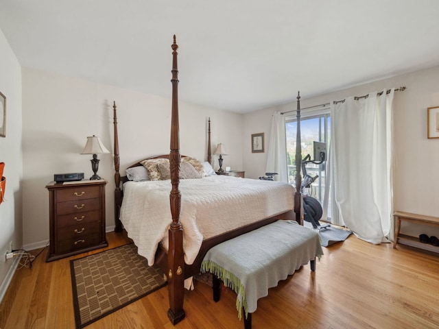 201 41st St, Downers Grove, IL 60515 - bedroom with light wood finished floors, access to outside, and baseboards