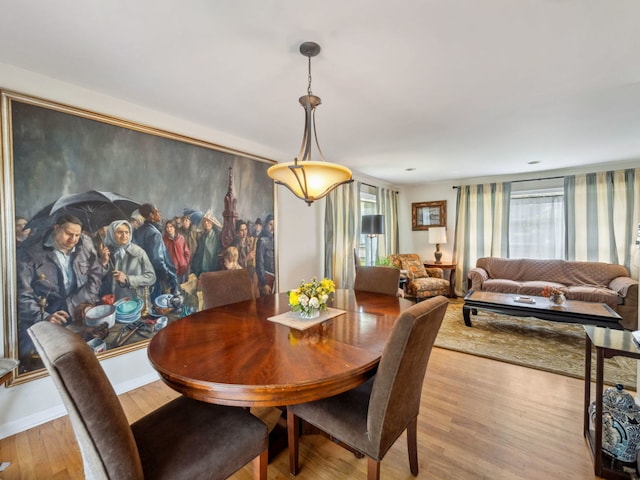 201 41st St, Downers Grove, IL 60515 - dining area featuring wood finished floors and baseboards